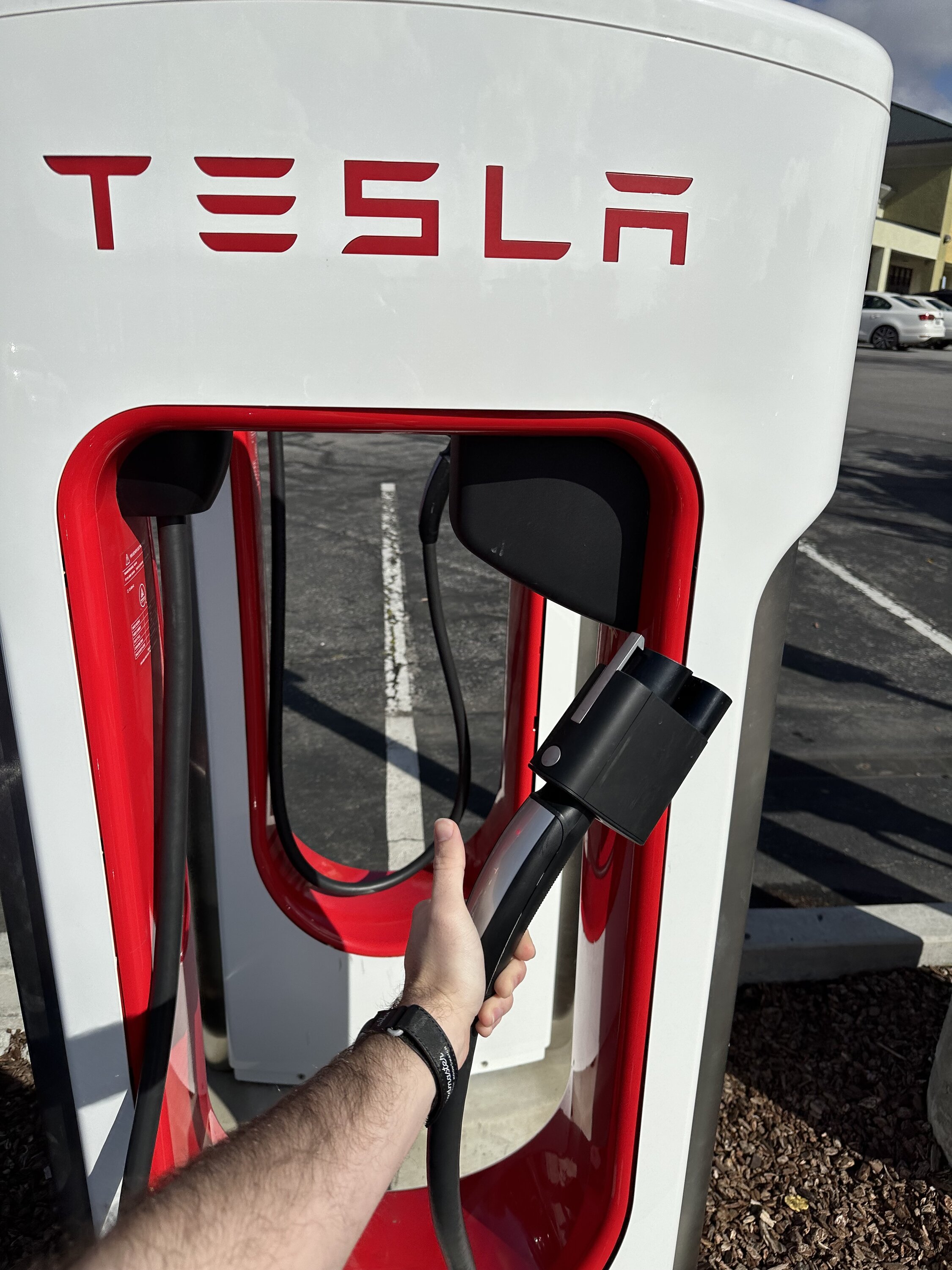 Porsche Taycan Report: Charging my Taycan at Tesla Supercharger with new CCS compatible magic dock 1678070811194